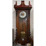 A mahogany Vienna wall clock