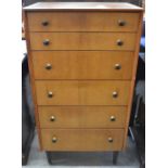 A 1960s/G Plan walnut tallboy chest of six drawers