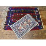 A Turkish kilim and another rug (2)