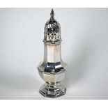 An octagonal baluster silver sugar caster