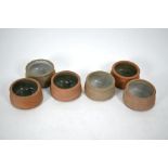 A set of six Bernard Leach (St Ives) stoneware paté pots