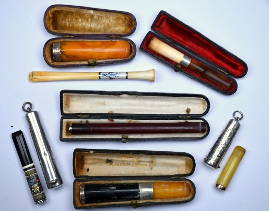 A collection of antique cheroot holders