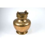 WITHDRAWN An antique Indian brass Puja holy-water vessel