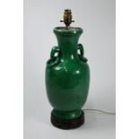 A 19th century Chinese porcelain baluster vase (lamped) with crackled green glaze