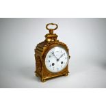 A late 19th century French Empire style ormolu mantel clock