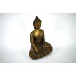 A Tibetan brass figure of Buddha Shakyamuni, 20th century, 37 cm high
