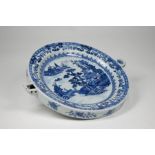 WITHDRAWN A Chinese blue and white pagoda landscape warming plate, Qing dynasty