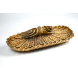 A 19th century carved giltwood desk tray in the form of a shell