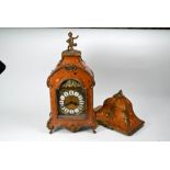 Lauris, a reproduction floral marquetry inlaid kingwood bracket clock