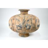 A substantial Chinese earthenware funerary cocoon jar in the Han dynasty style