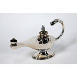 A silver 'Aladdin's Lamp' table cigar lighter