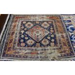 A blue ground Caucasion kazak design rug