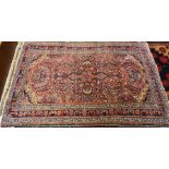 An antique Persian hand-made Lilian rug