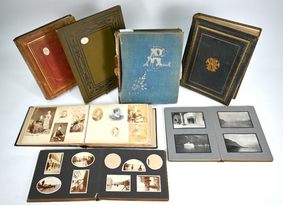 A Victorian embossed leather album of family photographs