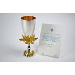 An Aurum Ltd ed parcel gilt silver commemorative goblet