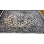 A fine Persian hand-made rug, signed by master weaver Shadsar