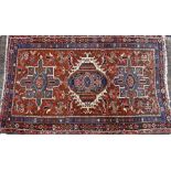 A small Persian Heriz rug