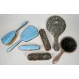 A silver and turquoise bas-taille enamel three piece brush set