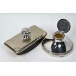 A silver capstan inkwell and a German rocker-blotter