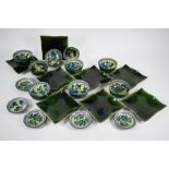 Eight Japanese soup bowls, matching pickle dishes and green glazed plates