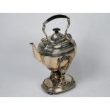 A late Victorian Regency Revival silver kettle on stand