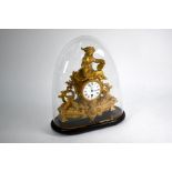 A late 19th century French gilt spelter figure surmounted mantel clock