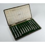 A cased set of six dessert knives and forks