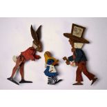 Three vintage fret-cut and painted Alice in Wonderland figures