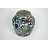 A Chinese doucai porcelain ginger jar and cover decorated with dragons
