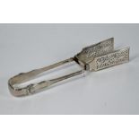 A pair of William IV silver modified Kings pattern asparagus/pastry tongs