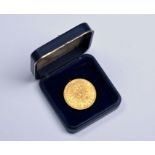 A gold 20 Mark coin dated 1887