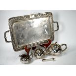 A Chinese export silver dragon decorated tea service by Zee Wo of Shanghai