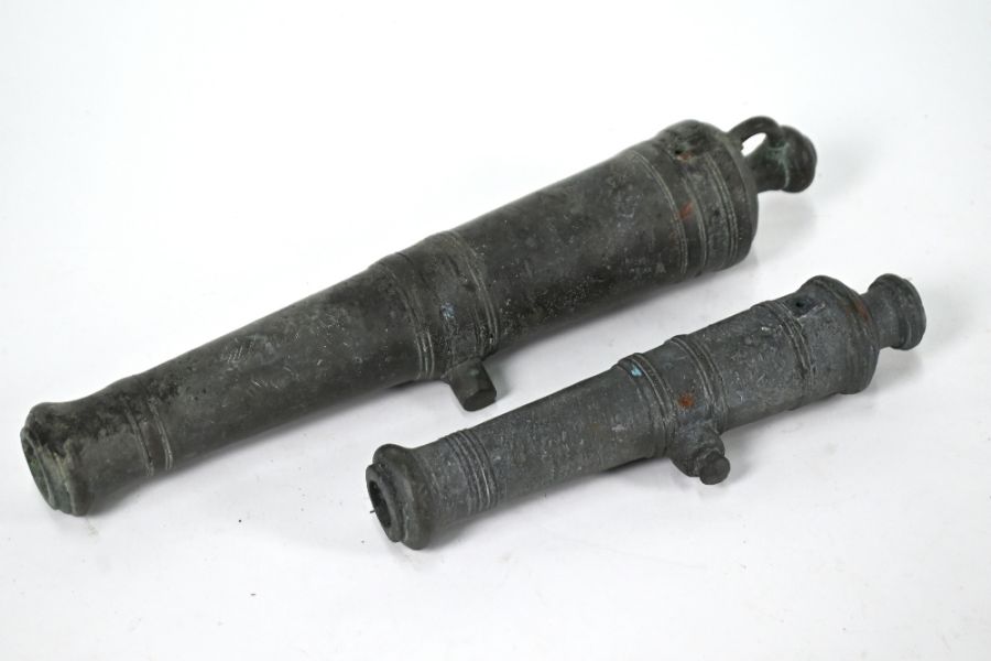 Two 19th bronze signal cannons
