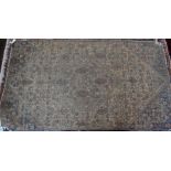 An antique Persian Hamadan camel ground rug
