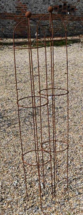 A pair of weathered steel ball head garden obelisks, 58 cm x 24 cm