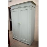 A duck-egg blue painted wardrobe