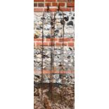 A pair of weathered steel arrow head garden obelisks, 58 cm x 24 cm