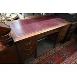 An early 20th century oak desk