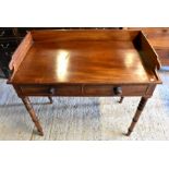 A mahogany two drawer hall table with galleried top