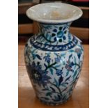 An Isnik pottery floral-painted baluster vase