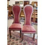 A pair of Victorian mahogany high-backed side chairs