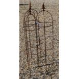 A trio of weathered steel arrow head garden obelisks, 110 cm x 27 cm