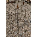 A trio of weathered steel arrow head garden obelisks, 96 cm x 38 cm