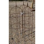 A pair of weathered steel arrow head garden obelisks, 124 cm x 34 cm