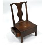 An 18th century oak box seat chair with drawer