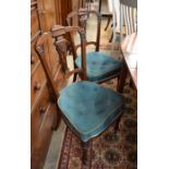 A pair of Edwardian overstuffed walnut side chairs