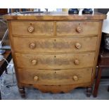 A Victorian figured mahogany bowfront chest of two short and three long drawers