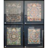 A set of eight framed Tibetan thankas
