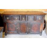 A 17th century and later oak sideboard