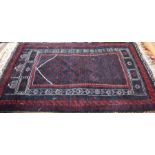 A Persian Beluchi rug